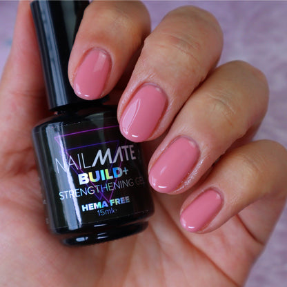 builder gel in a bottle with the gel painted on short length nails